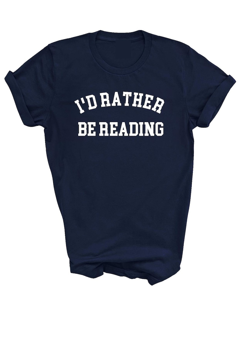 May include: A navy blue t-shirt with white text that reads "I'd rather be reading".