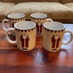 Debbie Mumm Folk Art Santas Collection Mugs (4)