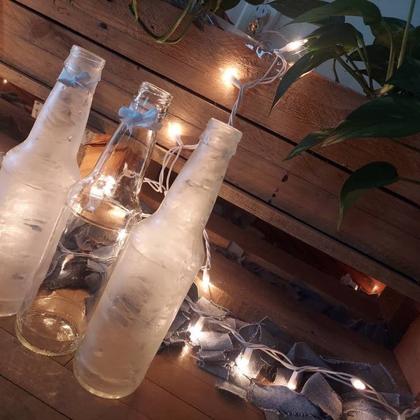 Stunning Frosted Glass Bottle Centerpieces image