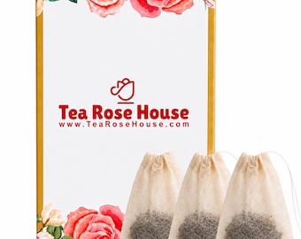 May include: A rectangular white box with gold edges, decorated with watercolour roses at the top and bottom. The box features the red text Tea Rose House and the website www.TeaRoseHouse.com. Three beige tea bags filled with loose tea leaves.