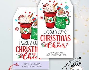 May include: Two white gift tags with a Christmas theme. Each tag features a red coffee cup with whipped cream, a gingerbread man, and the text "Enjoy a cup of Christmas Cheer." The tags are 2 x 3.5 inches.