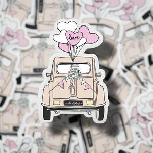 May include: A sticker depicting a light peach-coloured vintage car decorated for a wedding. The car has a bouquet of flowers, pink pennants, and balloons that say "love." The license plate reads "4 ever."