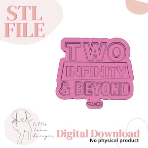 May include: A pink STL file digital download featuring the text TWO INFINITY & BEYOND in a bold, blocky font. The design includes a small logo at the bottom with a stylized dog outline and the text little luna designs. No physical product.