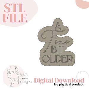 May include: A digital download STL file for a cutting machine. The design is a gray silhouette of the words "A Tiny Bit Older".