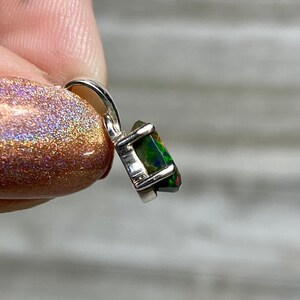 Black Opal in Sterling Silver Pendant from Curious Muse Crystals for 70. Tagged with black opal, crystal healing, Crystal Jewelry, energy work, flashy opal, hide-notify-btn, opal, opal crystal pendant, reiki crystal, Sterling, sterling silver, witchy