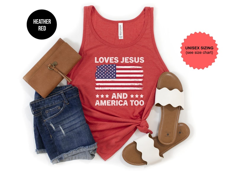 May include: Heather red tank top with a distressed American flag and the text "Loves Jesus and America Too".