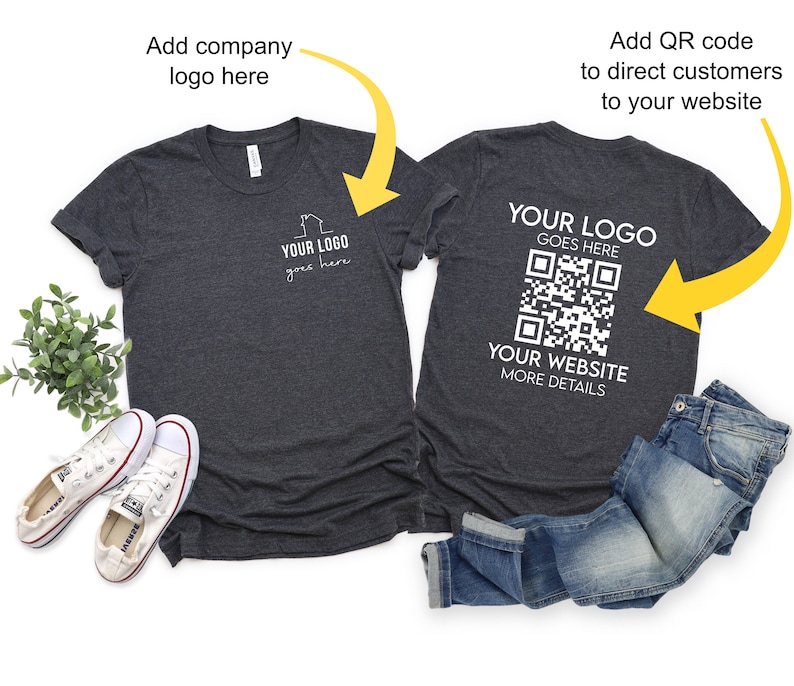 May include: A dark gray t-shirt with a white logo on the front and a QR code on the back. The text on the back reads "YOUR LOGO GOES HERE" and "YOUR WEBSITE MORE DETAILS".