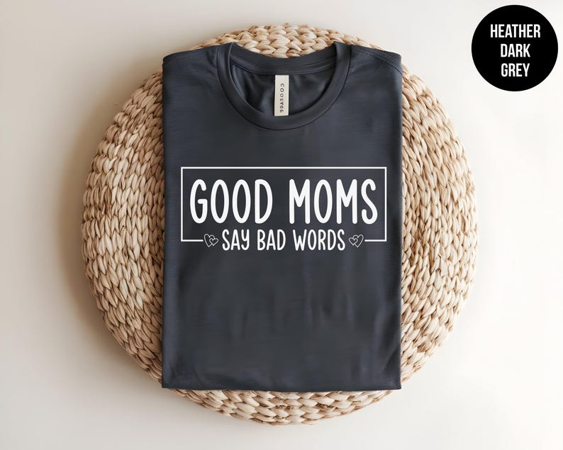 May include: Heather dark grey t-shirt with the text "Good Moms Say Bad Words" in white lettering.