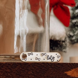Custom Personalized Dog Tag, Pet ID Tag, Metal Hand Stamped Dog Tag | Winter, Christmas | Holiday Bows Oblong Shaped Dog Tag