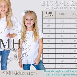 May include: White long-sleeve shirt with a ruffle detail on the sleeves. The shirt is available in sizes 12M to 12. Size chart with width and length measurements in inches.