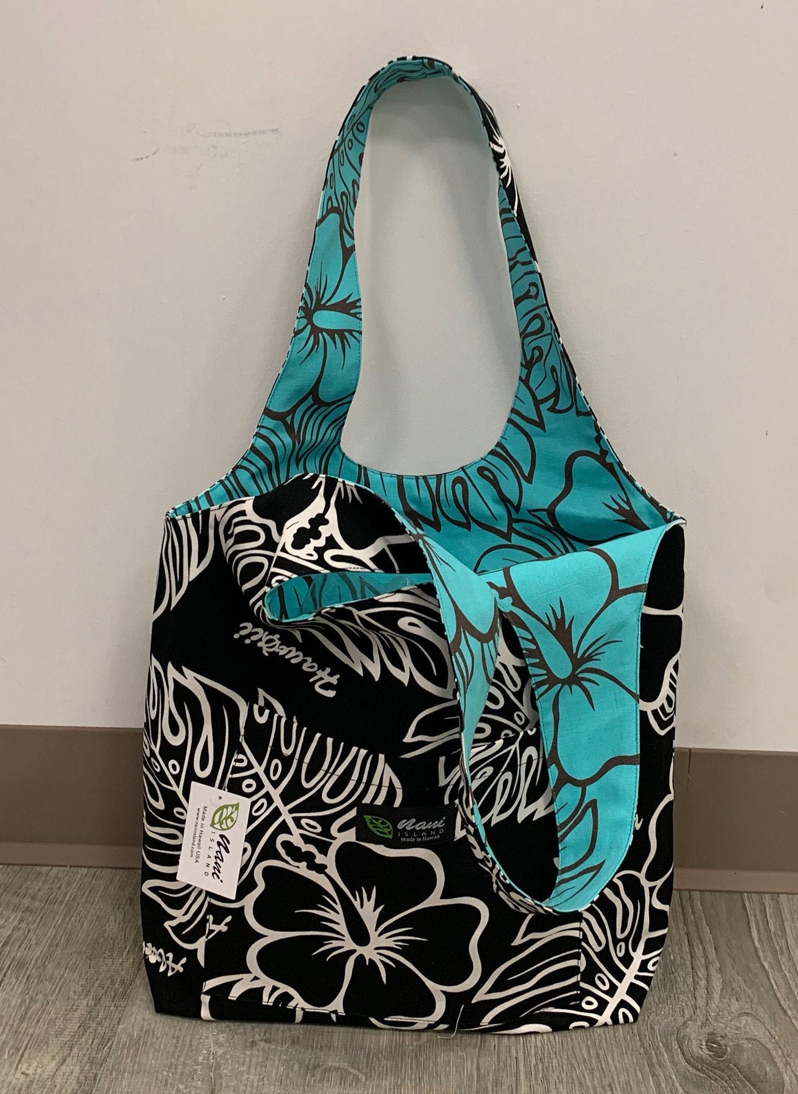 Tiki Hawaiian Pattern Print Leather Tote Bag main image 0