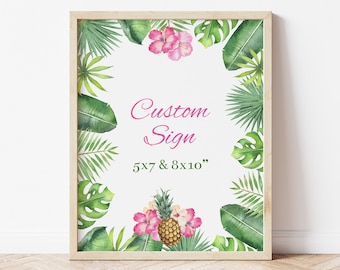 May include: A framed print with a tropical theme. The print features green palm leaves, pink flowers, and a pineapple. The text "Custom Sign 5x7 & 8x10" is printed on the white background.