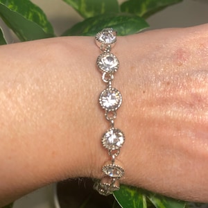 Avon 2010 Silvertone Tennis Bracelet Clear Sparkling Faceted Rhinestones New Old Stock Original Box