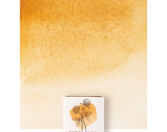 Acquerello color terra giallo caldo, mezza pastiglia. Acquerelli artigianali, ecologici e atossici. Materiale artistico fatto a mano.