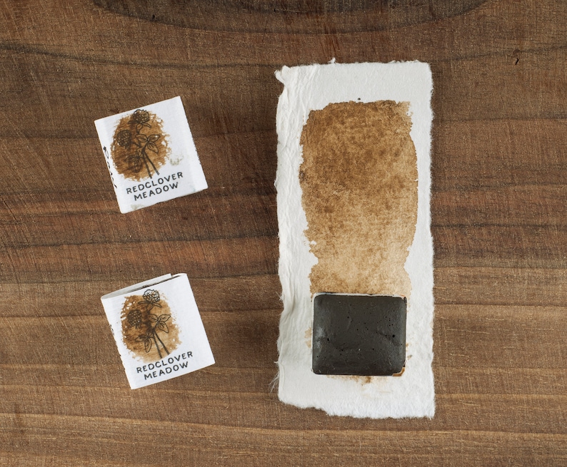 Raw Umber handmade paint half pan art supply.