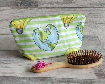 Cosmetic bag with a heart with a pattern of lightbulbs and a world map - inspirational accessory