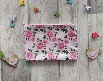 Small book bag for narrow paperbacks with a romantic rose pattern on delicate pink - a stylish accessory for book lovers