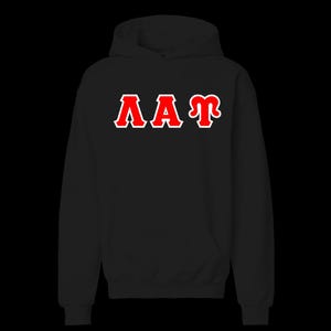 May include: A black hooded sweatshirt featuring the Greek letters Lambda, Alpha, and Tau printed across the chest. The letters are rendered in a bold red color with a thick white outline, creating a high-contrast design against the dark fabric.