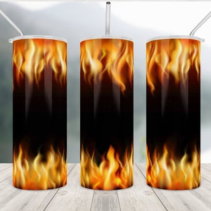 May include: Three stainless steel tumblers with a flame design. The design features orange and yellow flames against a black background. Each tumbler has a white lid and a silver straw. The tumblers are cylindrical and appear to be approximately 8 inches tall.