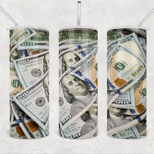 May include: A stainless steel tumbler with a design of US dollar bills. The bills are arranged in a random pattern and feature the portrait of Benjamin Franklin.