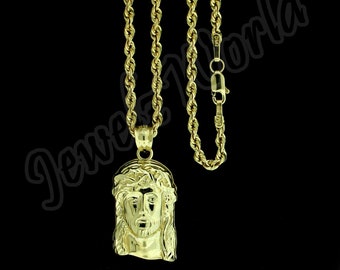 Jewels By Lux 10kt Gold Two-tone Textured Womens Jesus Ht:22.6mm x W:12.9mm Religious Charm Pendant. Jewels By Lux 10kt Gold Two-tone Textured Womens Jesus Ht:22.6mm x W:12.9mm Religious Charm Pendant.