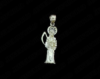 May include: A silver pendant featuring a detailed depiction of Santa Muerte, a skeletal figure holding a scythe and a heart. The pendant is designed in a traditional style.