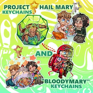 May include: A collection of acrylic keychains featuring illustrated characters and geometric shapes. The text reads PROJECT HAIL MARY AND BLOODYMARY KEYCHAINS. The designs include a green pentagonal structure, a space-suited figure, and chibi-style characters.