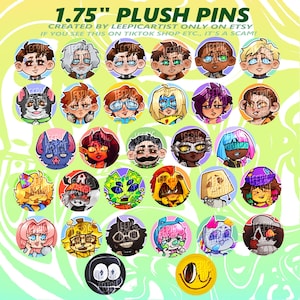 Puede incluir: Colección de pines de felpa de 4,4 cm con varios diseños de personajes de dibujos animados. Los pines redondos presentan ilustraciones de caras, animales y otras figuras sobre fondos coloridos. El texto dice "Created by Leepicartist only on Etsy".