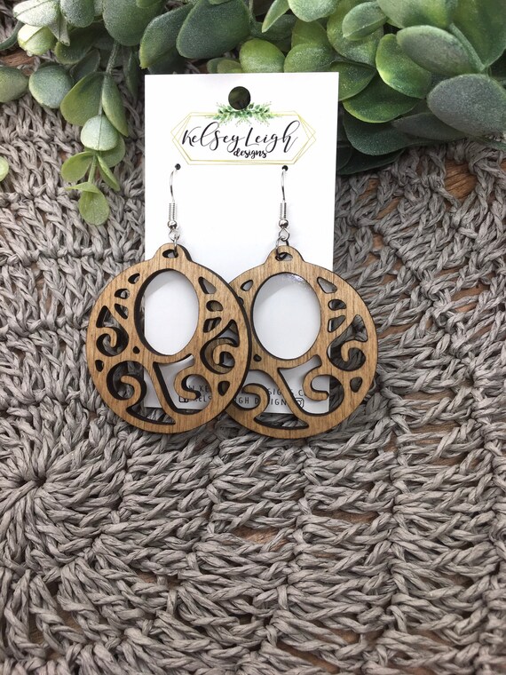 Geometric wooden laser cut earrings on Craiyon