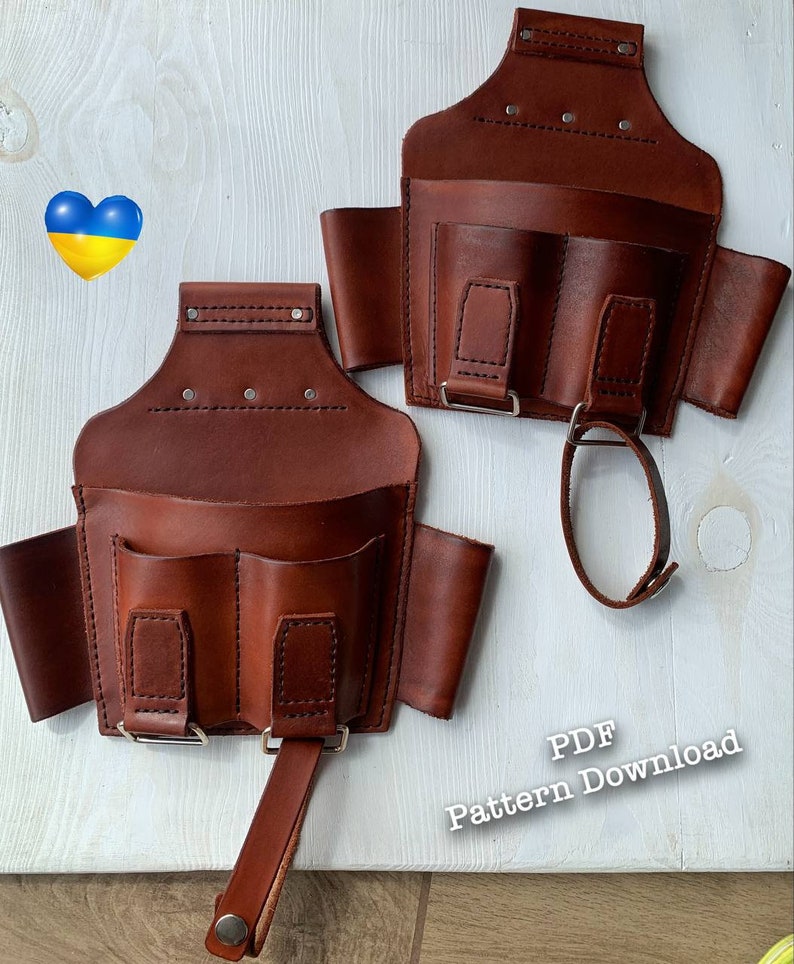 Peut inclure: Deux ceintures &agrave; outils en cuir marron avec plusieurs poches et une sangle. Le texte "PDF Pattern Download" est visible dans le coin inf&eacute;rieur droit de l'image.
