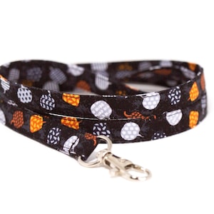 Cordón de patchwork de calabaza: porta credencial de algodón de Halloween