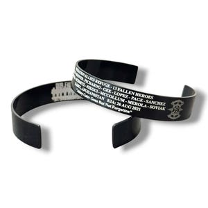 May include: Two black metal cuff bracelets featuring white engraved text. The text reads: OPERATION ALLIES REFUGE - 13 FALLEN HEROES, followed by names, KABUL, AFGHANISTAN KIA: 26 AUG 2021, and Abbey Gate: Gone But Not Forgotten, with a small emblem.