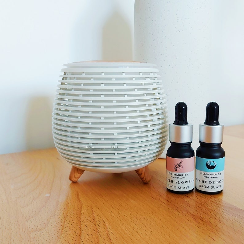 Evelyn Minimalistischer weißer Aromadiffusor Luftbefeuchter Ultraschalldiffusor für ätherische Öle und Duftöle Bild 1