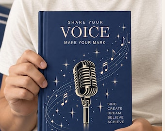 May include: A dark blue hardcover book featuring a gold illustration of a vintage microphone, musical notes, and stars. The text reads: SHARE YOUR VOICE MAKE YOUR MARK, and SING CREATE DREAM BELIEVE ACHIEVE. The cover has a clean, professional design.