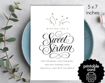 May include: A 5 x 7 inches white rectangular greeting card with black calligraphy text that reads Wishing You A Sweet Sixteen, Keep Dreaming, Keep Growing, And Keep Sharing Your Beautiful Light With The World, featuring small gold star icons.
