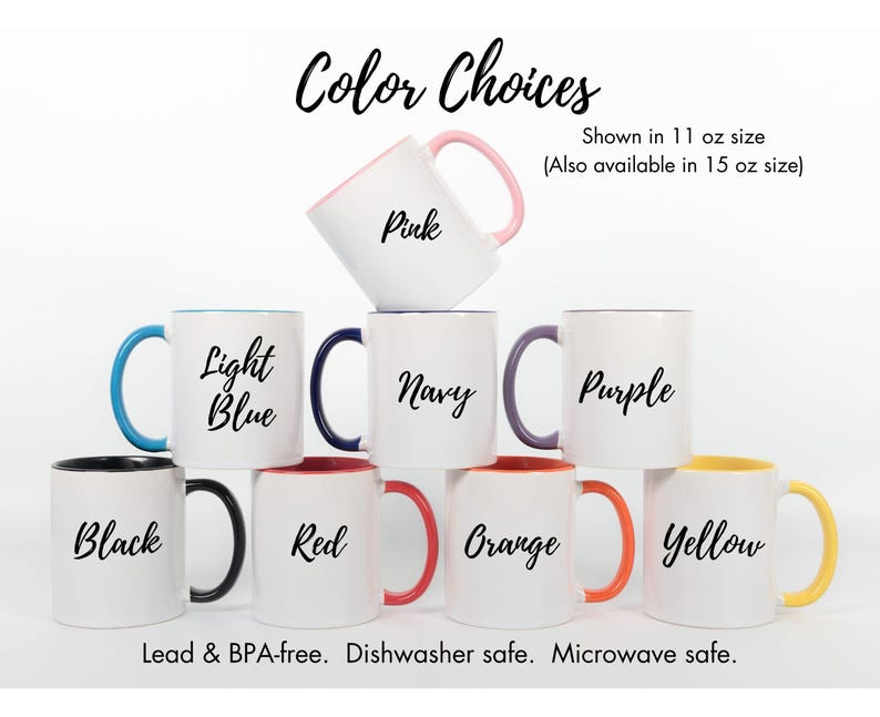 May include: A collection of white ceramic mugs with colored rims and handles, showcasing various color options: pink, light blue, navy, purple, black, red, orange, and yellow. Each mug has a corresponding color name written on it. The mugs are available in 11 oz and 15 oz sizes.