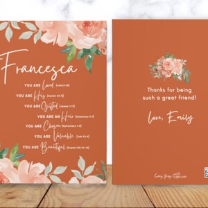 May include: A burnt orange book cover featuring watercolour floral illustrations in peach and green. The front displays the name Francesca and a list of affirmations with scripture references. The back reads Thanks for being such a great friend! Love, Emily.
