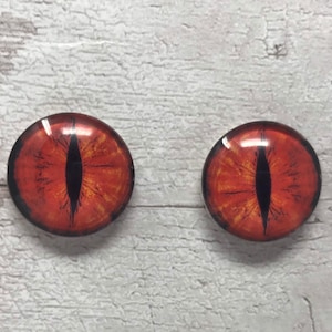 Donkerrode cabochons met glazen oog in de maten 6 tot 40 mm drakenogen katteniris (017)
