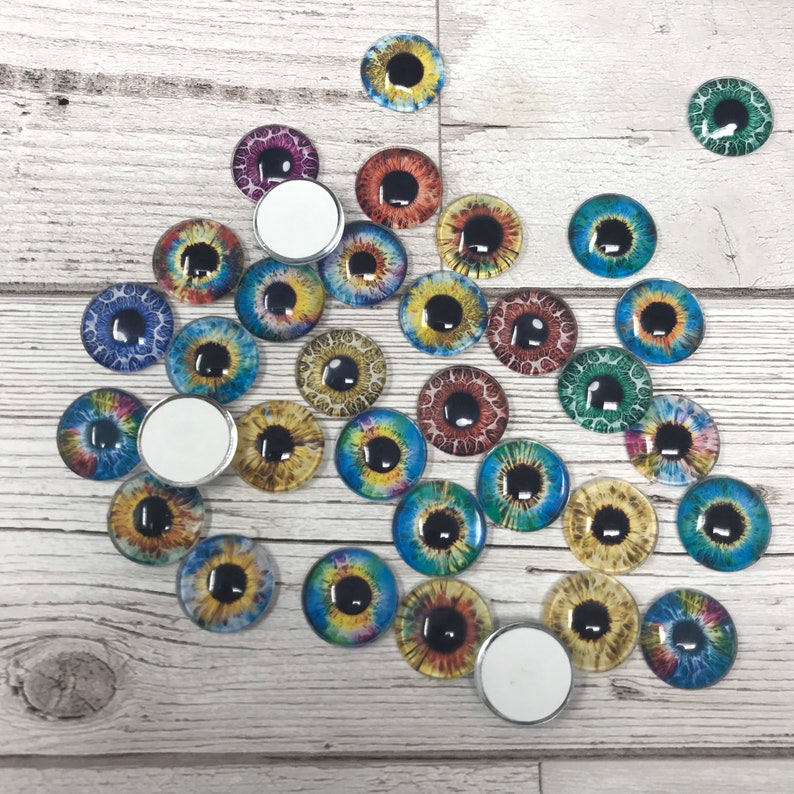 Pair of gold glass eye cabochons in sizes 6mm to 40mm dragon eyes cat fox iris 171