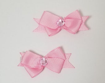 Clips de cheveux pink Bow pour bébé - 1 paire