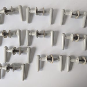 Set of 10 vintage door handle knobs. Light gray plastic houseware. Danish design handles for doors 60s 70s retro style Torpedo door handles
