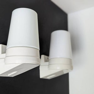 Set of 2 Sigvard Bernadotte sconces for IFÖ. Milky white bathroom lamps number 6070. Scandinavian Mid-century design in glass & Ceramic