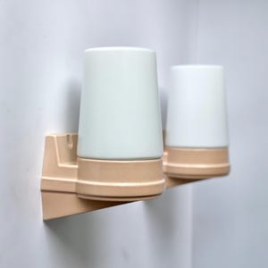 Set of 2 Sigvard Bernadotte sconces for IFÖ - Powder rose / beige Bathroom Lamps number 6070 - Mid-century Swedish design in glass & Ceramic