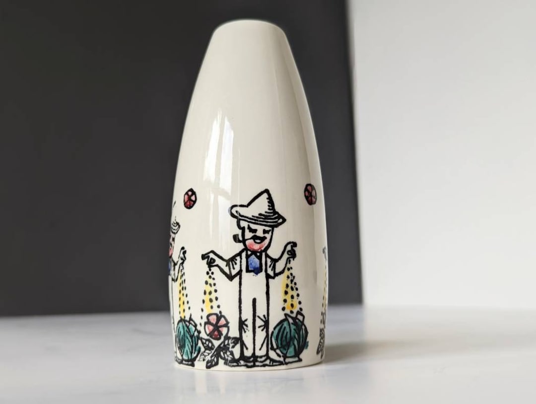 スタヴァンゲルフリントの花瓶。70年代の農夫が畑に種を蒔く様子を描い