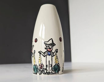 スタヴァンゲルフリントの花瓶。70年代の農夫が畑に種を蒔く様子を描い