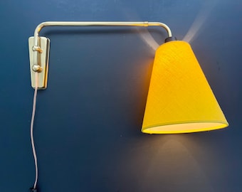 Rare swing arm wall lamp made in shiny brass - Scandinavian adjustable design telescopic tube from around the 50-60s. with new yellow shade.
