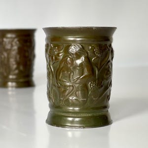 Just Andersen 159 Danish "disko metal" vase. Heavy & decorated with Samson and Delilah scene. Art Deco Disko metal ware from the 1930s.