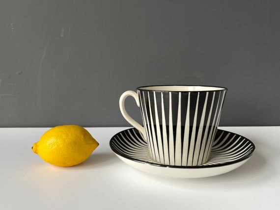 Duo ZEBRA Tea - Gefle, Sweden. Zebra by Eugen Trost. Green Logo