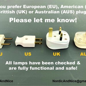 May include: Four different types of electrical plugs: European (EU), American (US), British (UK), and Australian (AUS). The text reads "Do you prefer European (EU), American (US), Brittish (UK) or Australian (AUS) plug? Please let me know!" and "All lamps have been checked & are fully functional and safe!"