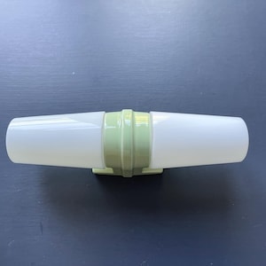 Double shaded sconce 6060 by Sigvard Bernadotte IFÖ. Light green porcelain and glass shades. High quality. Swedish design midcentury sconce.